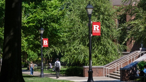 Rutgers–New Brunswick campus in the summer with students walking in background